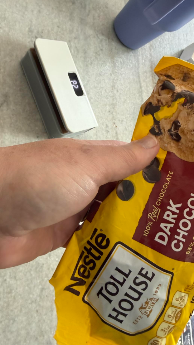 Opening a resealed bag of chocolate chips