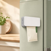 LockNSeal Mini Bag Sealer attached to fridge with magnetic base